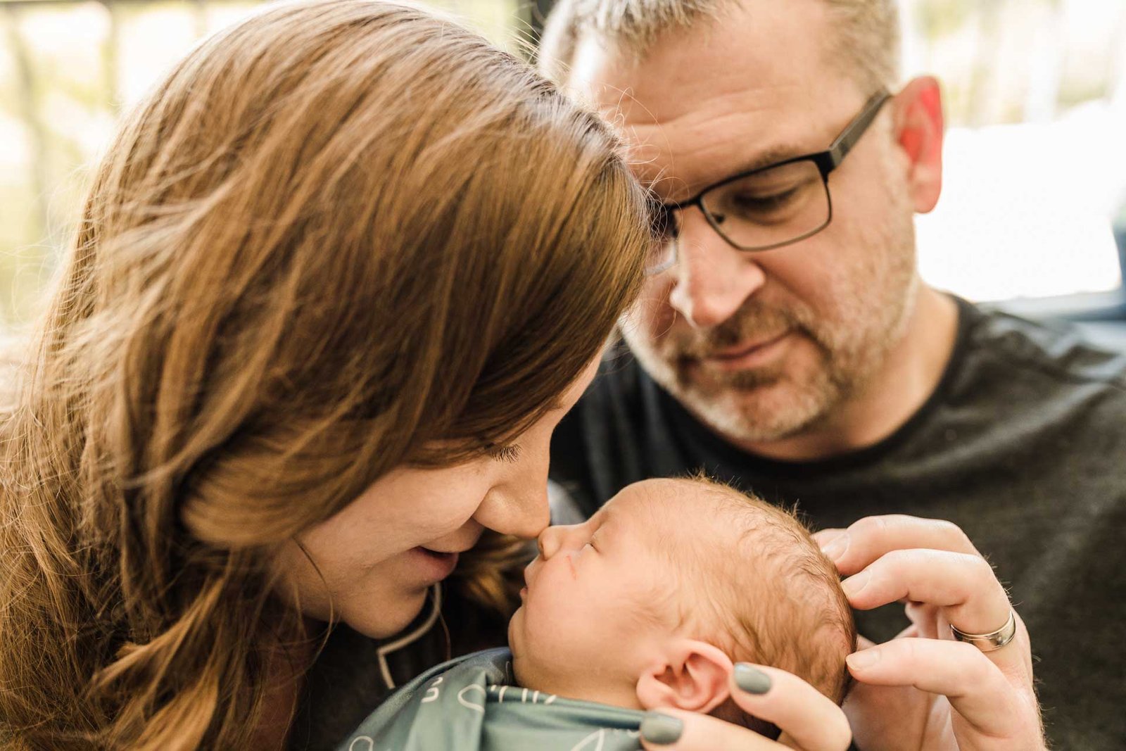 Mom touching her nose to her baby's nose during Denver Lifestyle Photography